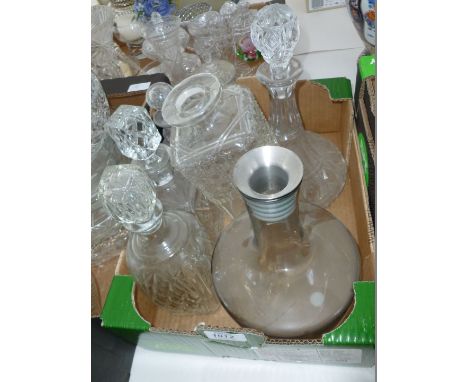 A ship's Decanter, four others with no stopper, crystal cut tankard, etc.