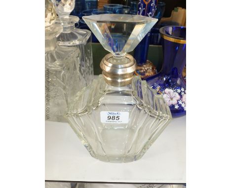 An Art Deco style stepped Decanter with silver band, marked Walker and Hall.