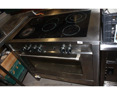 A Kenwood stainless steel Commercial five ring Ceramic hob top and Oven below, 1.2 m x 64 cm. deep x 90 cm. high