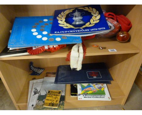 A quantity of various sporting memorabilia, including rattles,scarves, coins etc.