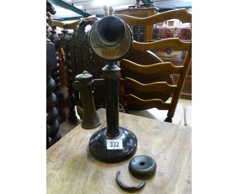 A vintage brass and bakelite stick telephone- damage to bakelite ear piece