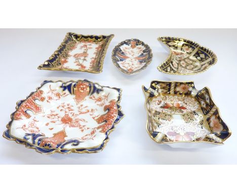 Five Royal Crown Derby trinket trays:&nbsp;Square, 986, 2712-1900; Slim oval – 4.75in, 2712-1895; Rect., 913, Rouen – 5in, 26