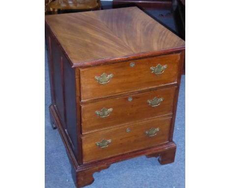 Early 20th century mahogany three-drawer office-style chest, the drawers with lower roller mechanisms and brass handles, pane