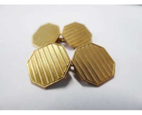 A pair of hallmarked 9-carat yellow-gold octagonal cufflinks with engine-turned decorated&nbsp;(approx. 6.06g)