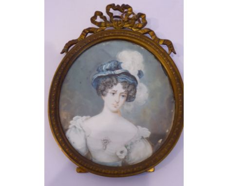 An early 20th century oval gilt-framed shoulder-length portrait miniature; after the original portrait of&nbsp;la Duchesse Du