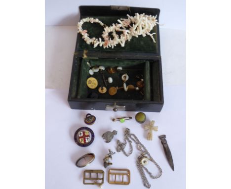 An early 20th century jewellery box and contents to include a coral necklace, enamel badges, buckles, engraved buttons, studs