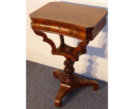 An early/mid-19th century Continental inverted bow-fronted flame mahogany and boxwood-strung work table; the quarter veneered