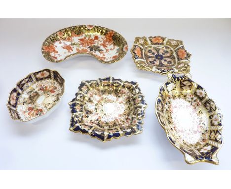 Five Royal Crown Derby trinket trays:&nbsp;Square fluted, 986, 1128-1929;&nbsp;Square fluted, 986, 2451-1916; Lozenge, 1802 –