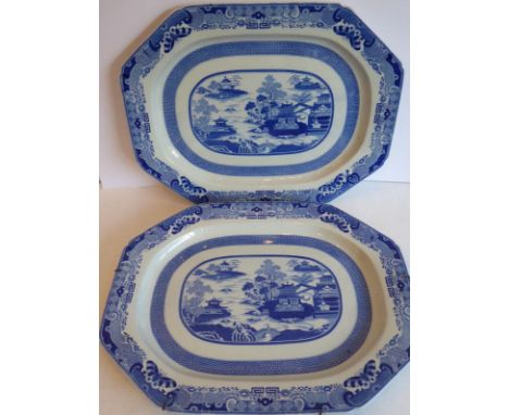 A rare pair of 19th century octagonal Spode ceramic meat platters; transfer-decorated in the Willow-pattern style and with bl