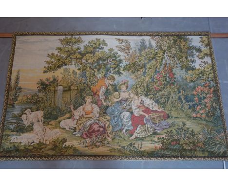 A 20th century French tapestry, 'Le Nid', depicting young ladies and a young man in a garden setting, 90 x 149cm 