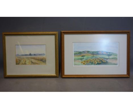 Two watercolours, to include a landscape of a field before harvest, indistinctly signed in pencil to lower right, framed and 