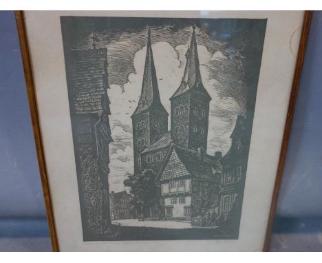 Fritz Rohre (German), a woodcut print of a street scene with a church, signed and inscribed in pencil to lower margin, 39 x 2