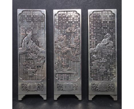 A Chinese Republic period miniature silver screen in three parts, depicting Chinese ladies and auspicious objects, dated 1920