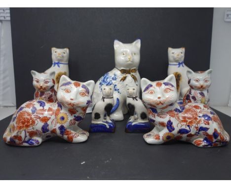 Two pairs of early 20th century Chinese ceramic cats, with character marks to base, together with 2 other pairs and one other