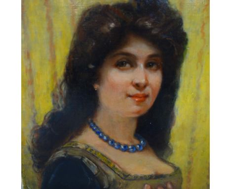 An oil on canvas of a portrait of a lady, signed lower right, 44 x 37cm 