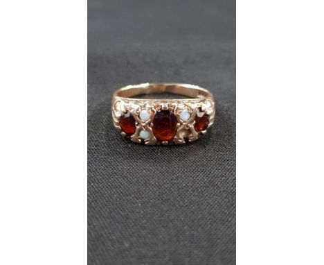 9 CARAT GOLD GARNET AND OPAL RING 