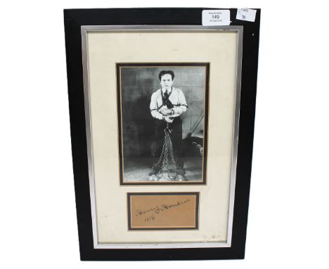 Harry Houdini signed and dated 19 / 6 - framed with a photograph of Harry in chains - With coa on reverse. It measures approx