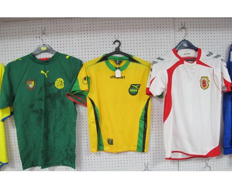 Football Shirts - Cameroon, by Puma circa 2008 size S. Gibraltar white by Hummel 2010-12. Jamaica yellow by UHLSport 34/36 (3