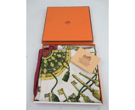 A boxed Hermes scarf