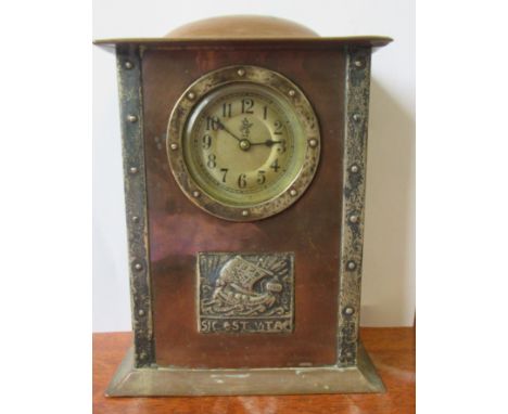 An Arts and Crafts style copper cased mantel clock, with silver coloured mounts, height 7ins Condition Report:   The clock, e