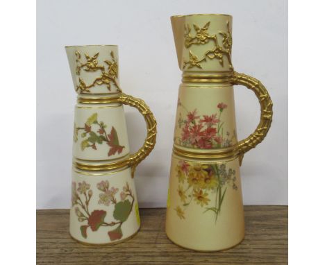 A Royal Worcester blush ivory jug, together with a gilt ivory jug, decorated with flowers, shape No 1047, height 9ins and 8in