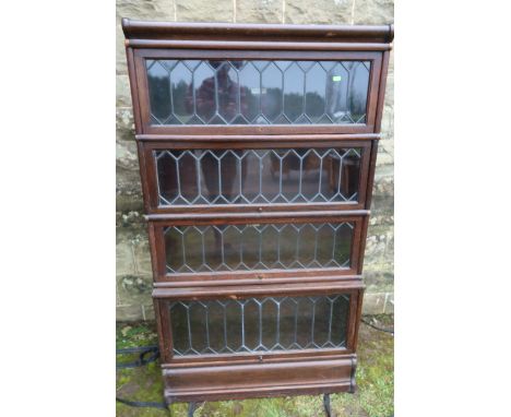 A Globe Wernicke leaded light four section bookcase, width 34ins, depth 14ins, height 60ins&nbsp;