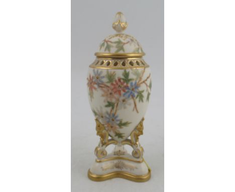 A Grangers Worcester vase, raised on a pedestal, with pierced neck, decorated with shot silk colours to three masked legs, he