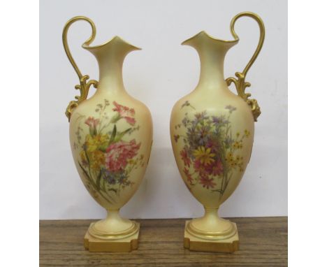 Two Royal Worcester blush ivory ewers, decorated with flowers, shape No.1944, height 9.5ins&nbsp;