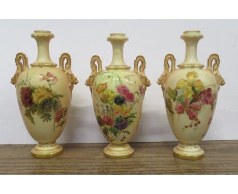 Three similar Royal Worcester vases, decorated with flowers to a blush ivory ground, shape No 1399, height 6.25ins&nbsp;&nbsp