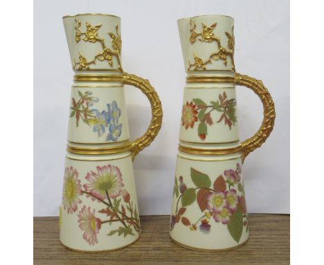 Two similar Royal Worcester gilt ivory jugs, decorated with shot silk flowers, shape No 1047, height 10ins&nbsp;