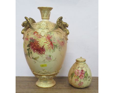 A large damaged Royal Worcester vase, decorated with flowers to a blush ivory ground, with griffin handles, shape No. 1619, h