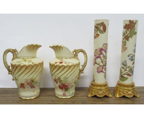 Two Royal Worcester jugs, decorated with flowers to a blush ivory ground, shape No 1562, height 5ins together with a pair of 