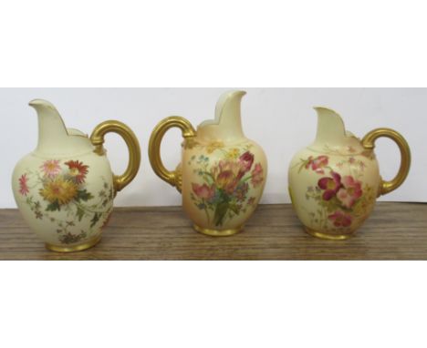 Three Royal Worcester blush and gilt ivory flat back jugs, shape No. 1094, height approx. 5ins&nbsp;