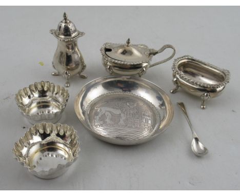 A collection of hallmarked silver cruets and salts together with a silver dish, decorated with a mythical creature, stamped 8