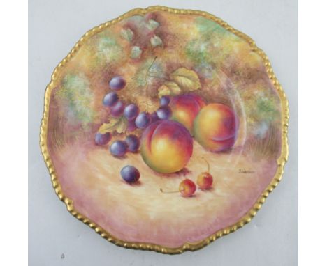 A Royal Worcester cabinet plate, with gilt gadrooned edge, decorated with hand painted fruit, signed S.Weston, diameter 10.5i