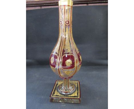 A 19th century Biedermier Bohemian glass vase, with ruby staining and clear glass panels with Rocaille gilt enamelling, heigh