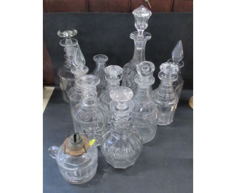 A collection of 19th century and later decanters (10), 2 missing stoppers,&nbsp;together with an oil lamp base