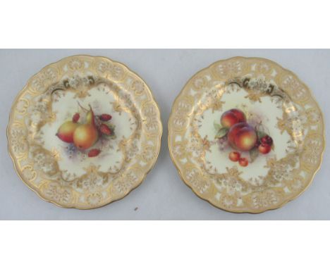 A Royal Worcester plate, the centre decorated with apples and cherries by Richard Sebright, to a rich gilt boarder, dated 192