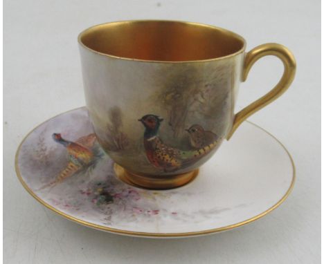 A Royal Worcester miniature cup and saucer, decorated with pheasants in landscape by J A S Stinton&nbsp;