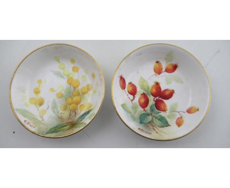 Two Royal Worcester pin dishes, decorated with flowers by Kitty Blake, diameter 3.25ins&nbsp;