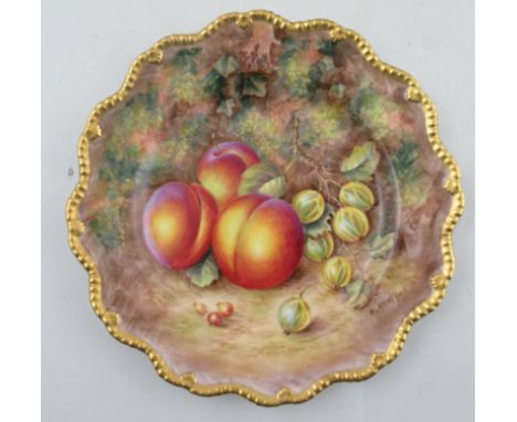 A Royal Worcester star shaped plate,with gilt gadrooned edge, decorated with hand painted fruit by H Ayrton, diameter 8.75ins
