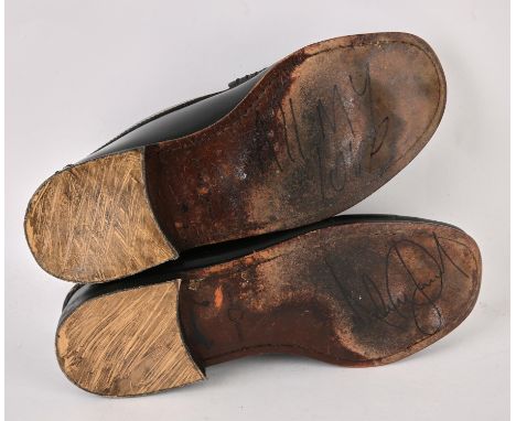 Michael Jackson - A pair of black loafers by Florsheim that were worn on stage by Michael Jackson during Dangerous Tour, 1992