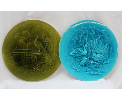A Burmantofts Faience plate depicting ducks and a turtle, signed P Mallet in turquoise, 27.5cm diameter together with another
