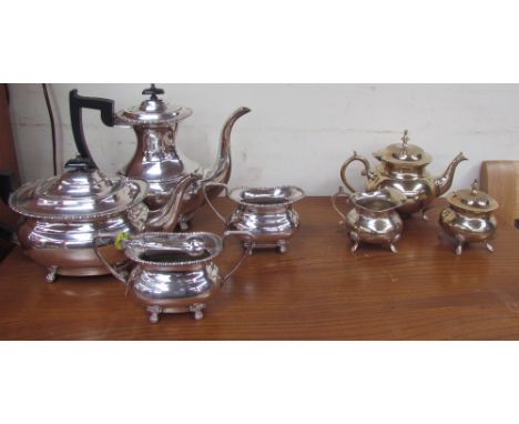 An electroplate part tea and coffee service together with another part coffee service