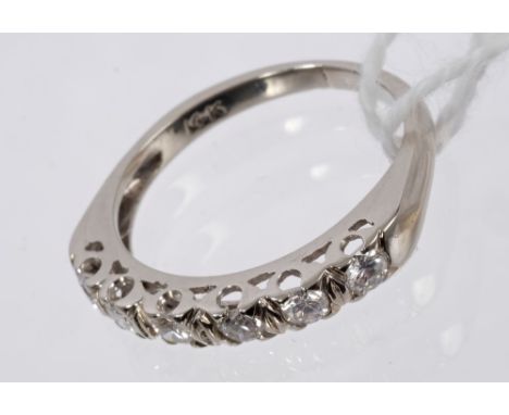 Diamond eternity ring with a half hoop of six brilliant cut diamonds in 14ct white gold setting.  Ring size approximately J