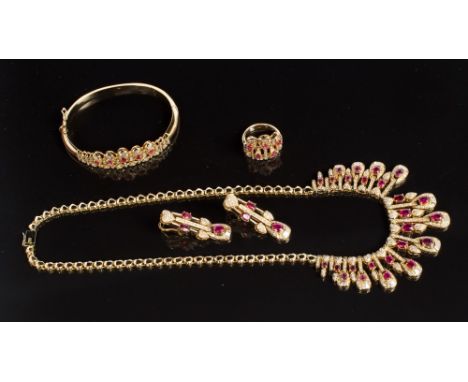 Eastern yellow metal ruby and diamond suite of jewellery - comprising necklace, bangle, ring and pair of earrings, each set w