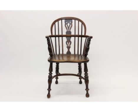 Good early 19th century yew and elm Windsor chair, stick back with pierced vase splat and solid saddle seat on turned support