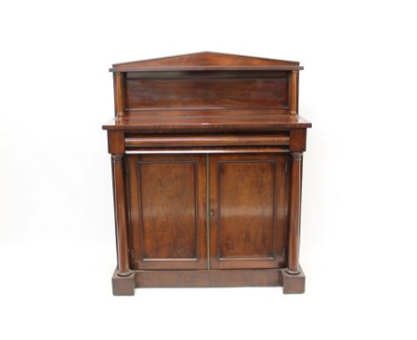 Early Victorian mahogany chiffonier with arched gallery back and shelf, raised on turned columns, having cushion frieze drawe