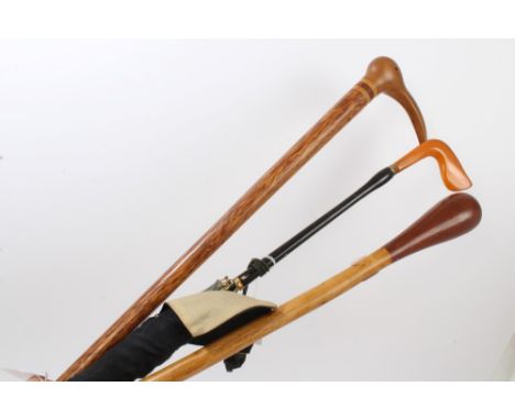 Vintage Pitcairn Island walking stick, the handle modelled as a seabird head, 91cm long, together with stick believed to have