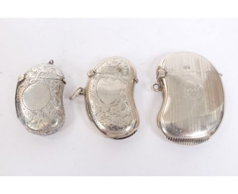 Victorian silver vesta of kidney form, with engraved floral and vacant cartouche (Birmingham 1899), another similar (Birmingh